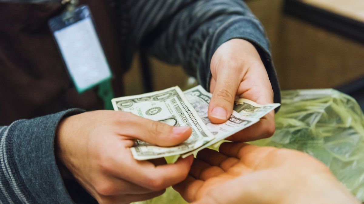 Paying for Your Flight with Cold, Hard Cash