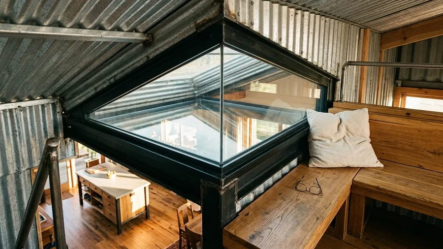 Corrugated Steel Loft with Glass Floor Hatch