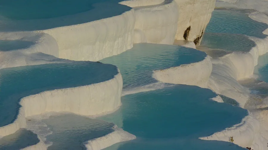 Pamukkale terraced pools look like frozen waterfalls